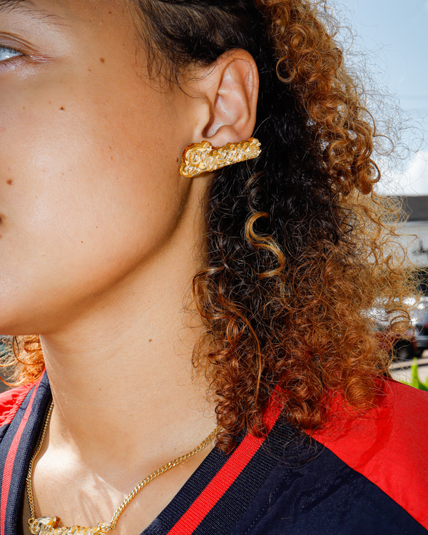 melody ehsani texans stud earrings (gold)