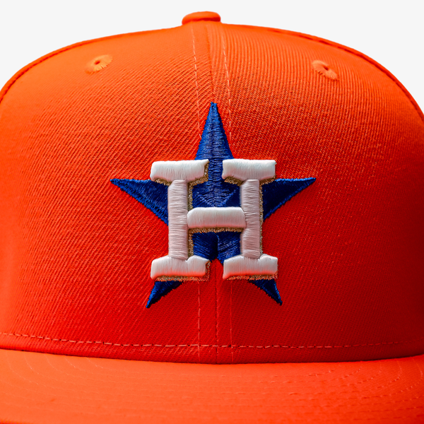 Houston Astros orange cap with a logo on a white background