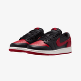 gradeschool jordan 1 retro low og "banned" (black/varsity red)