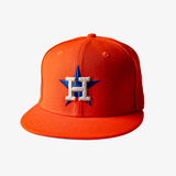 Houston Astros orange cap with a logo on a white background