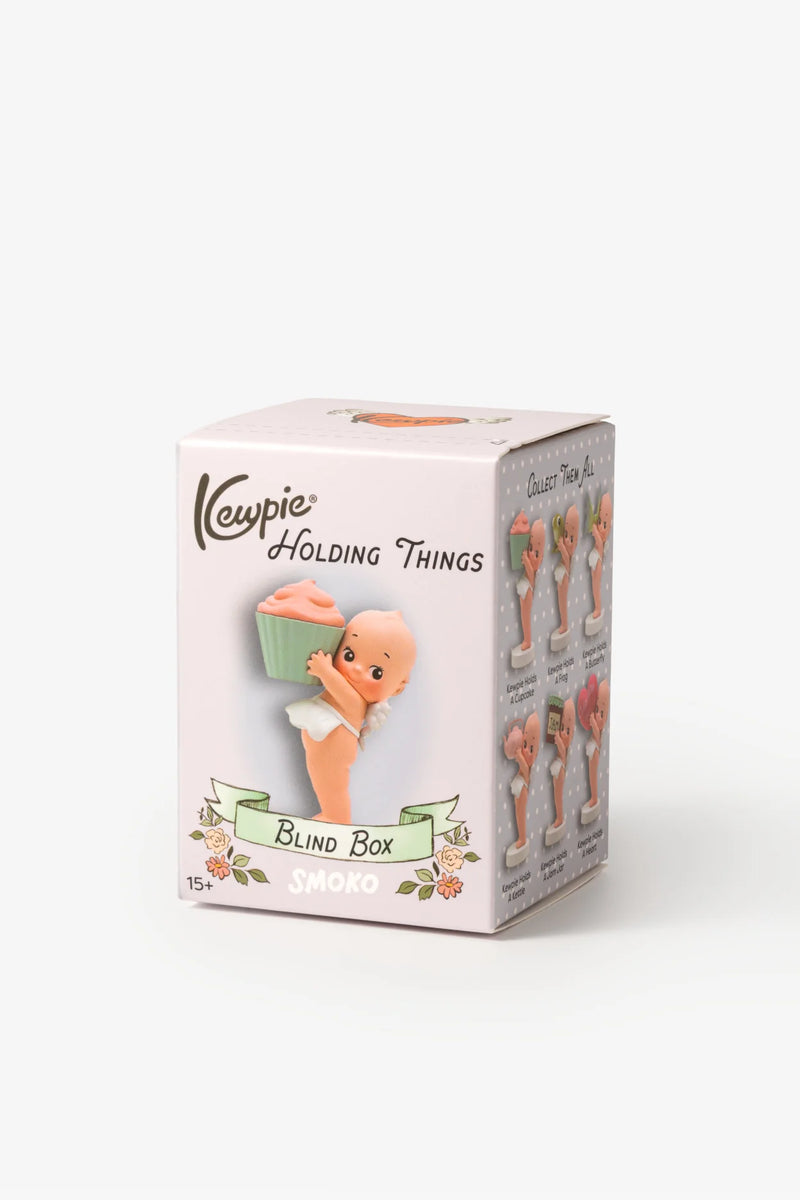 smoko kewpie holding things blind box figure